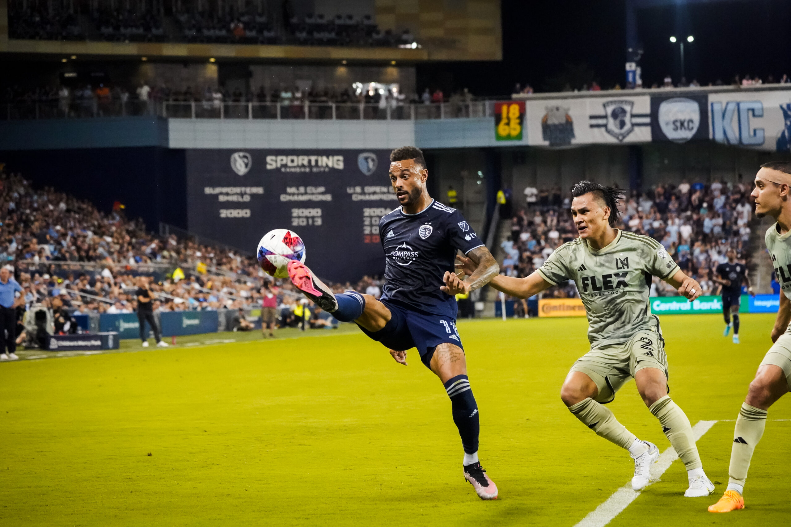 Sporting KC's Khiry Shelton fends of LAFC defender