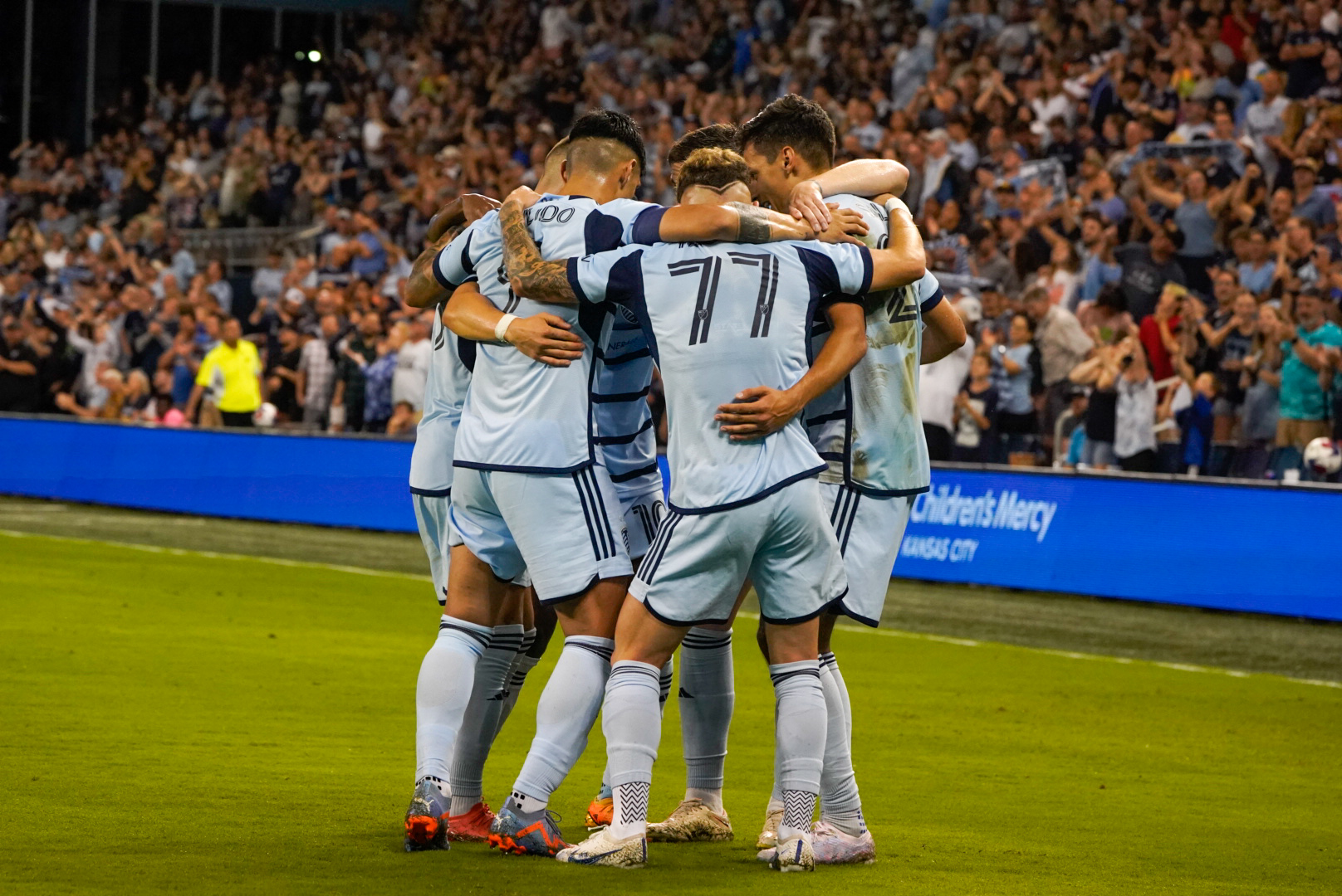 Sporting KC celebrates a goal with the wiggles.