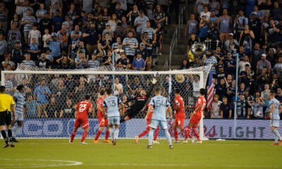 Toluca keeper dives in Leagues Cup match vs Sporting KC at Children's Mercy Park.