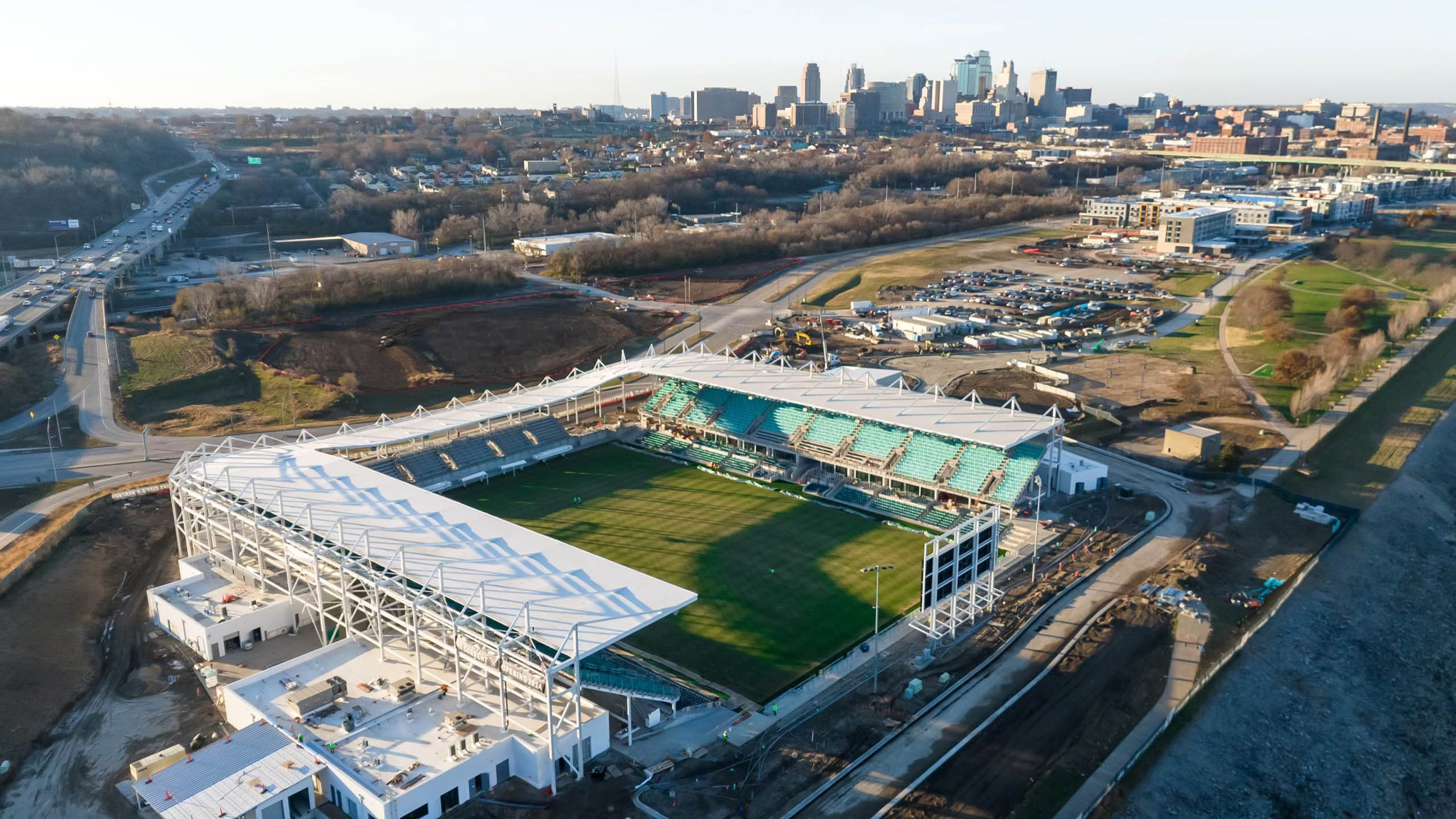 Newly constructed CPKC Stadium overlooking the Kansas City skyline, resting comfortably along the Mighty Missouri River in the Heart of America